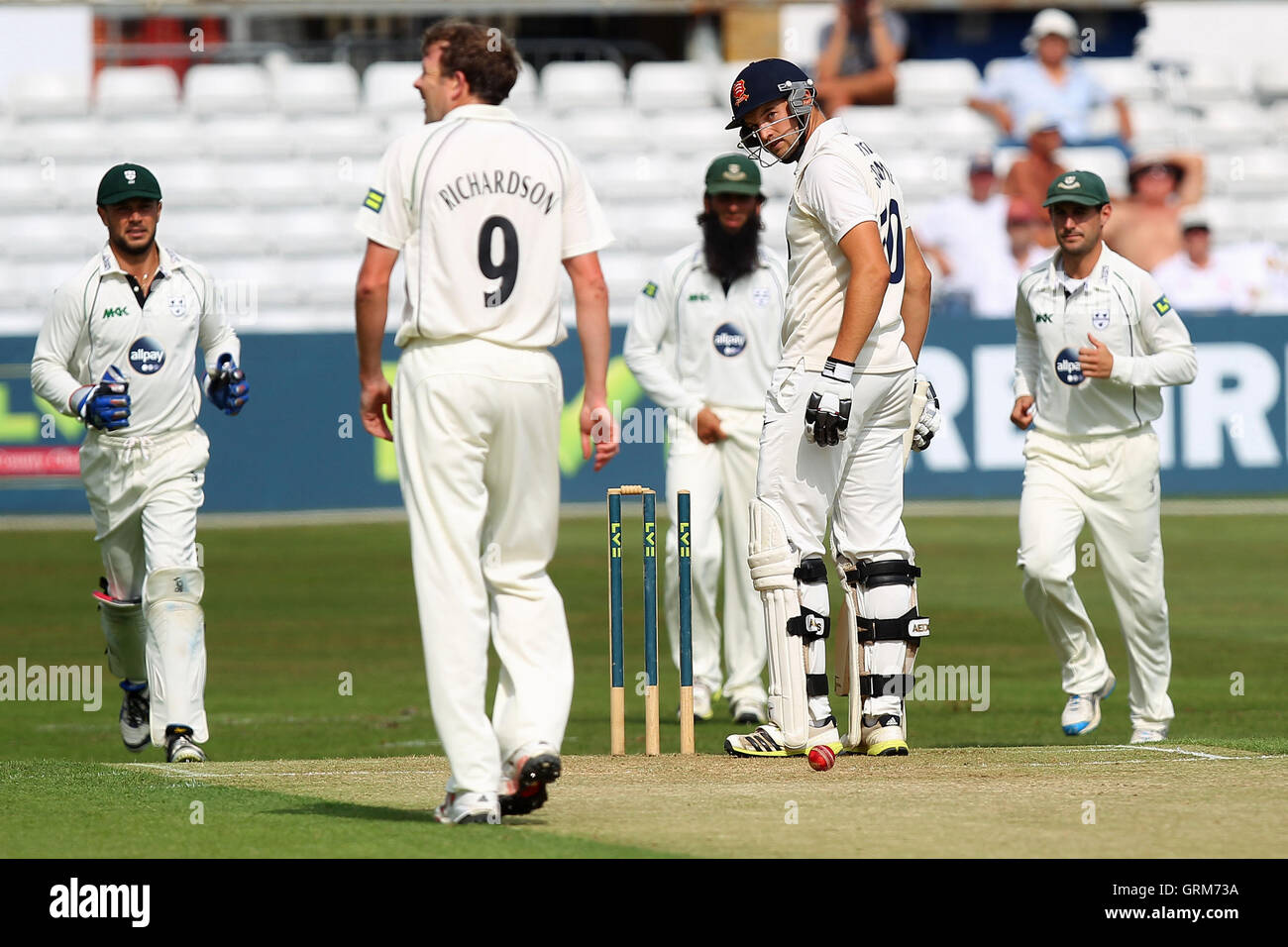 Essex batsman Nick Browne looks on ruefully after the ball bounces onto