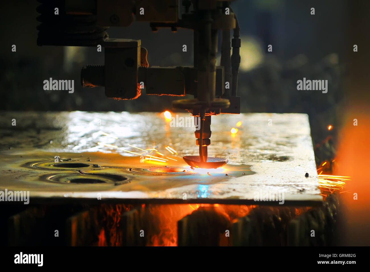 Laser cutting metal sheet Stock Photo