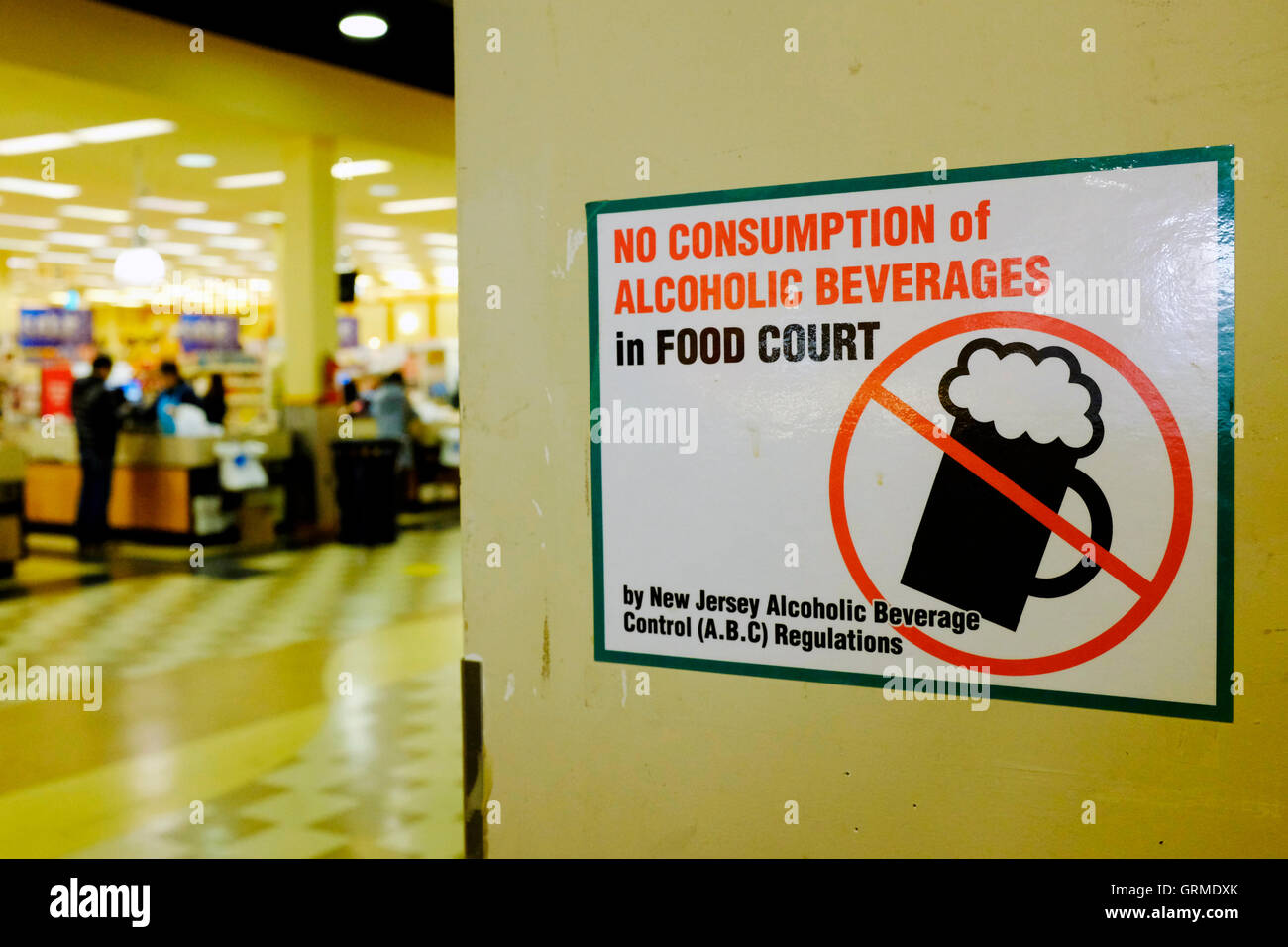 "No Consumption of Alcoholic Beverages" sign in a food court in a