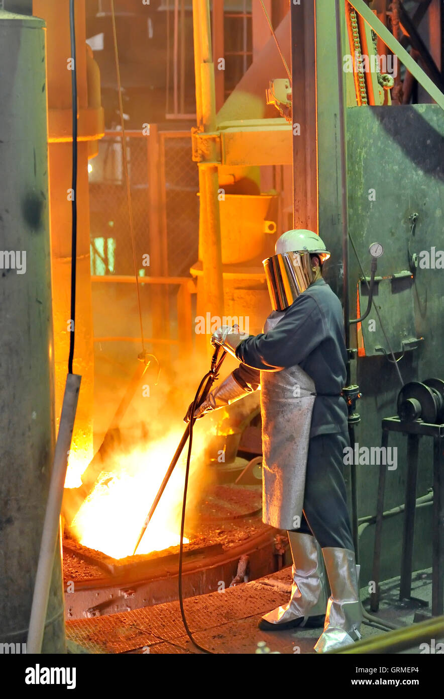 worker with hot steel Stock Photo Alamy