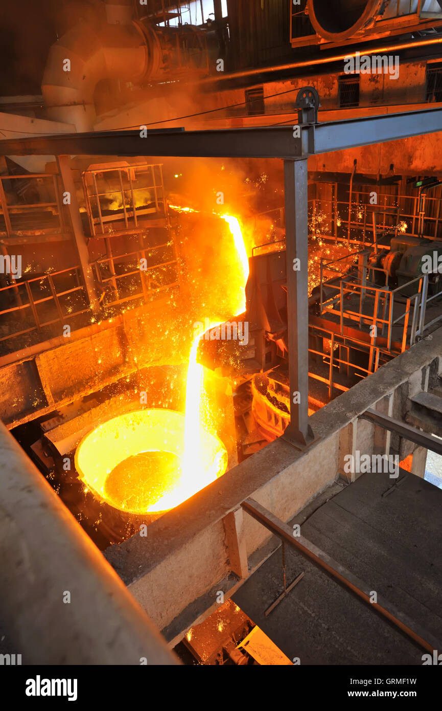 Foundry - molten metal poured Stock Photo