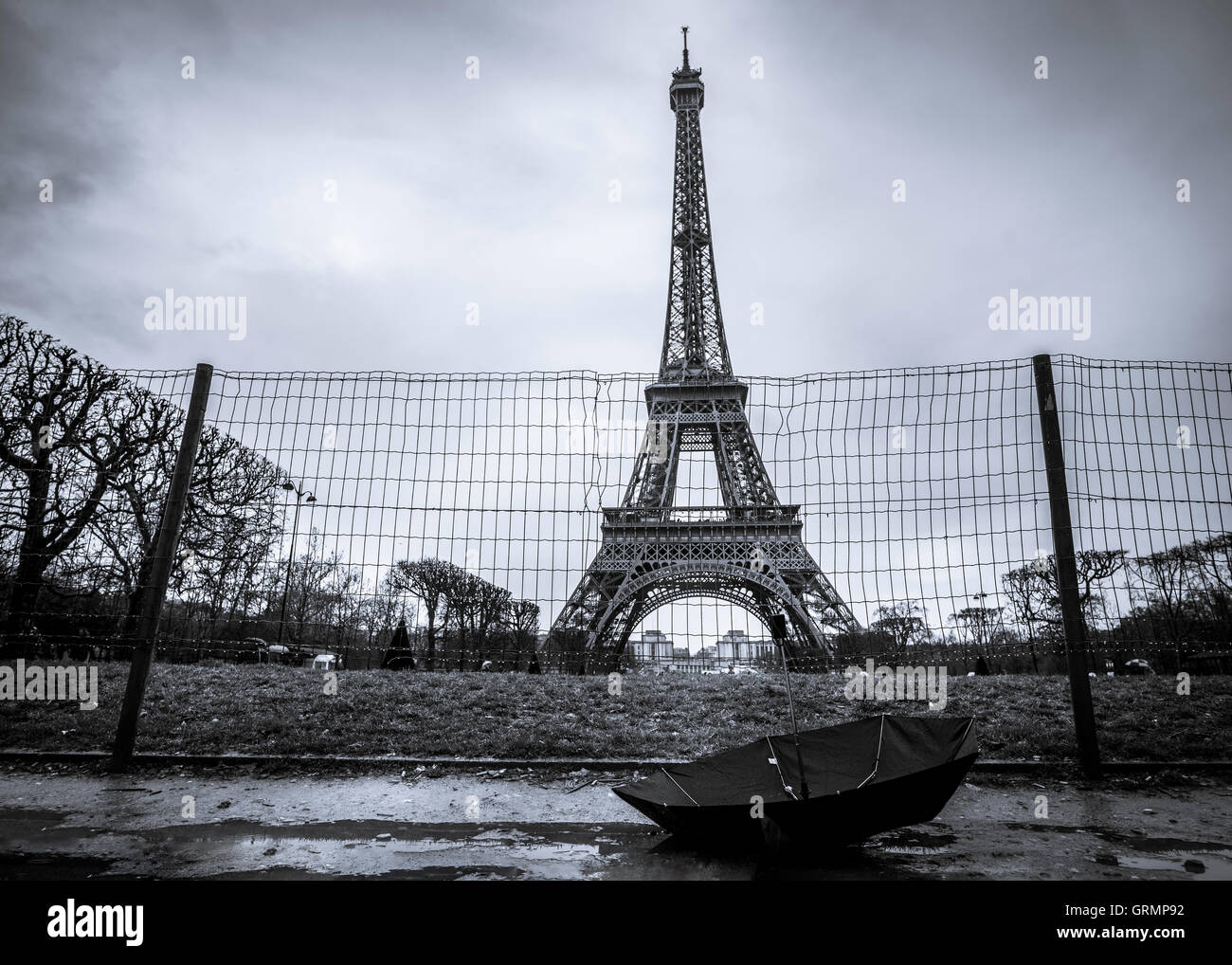 Eiffel tower and umbrella on a rainy day Stock Photo