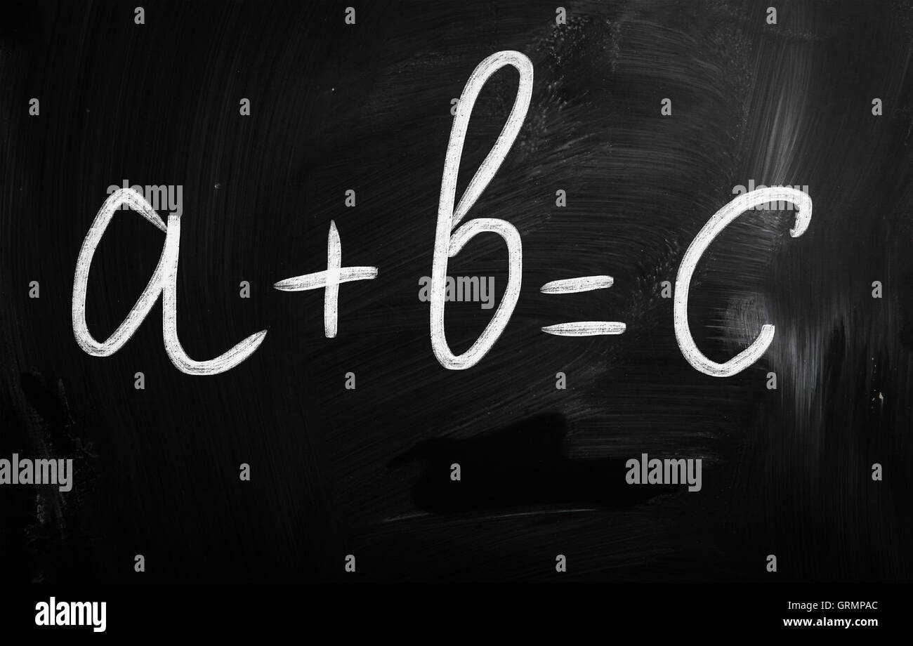 a+b=c handwritten with white chalk on a blackboard Stock Photo