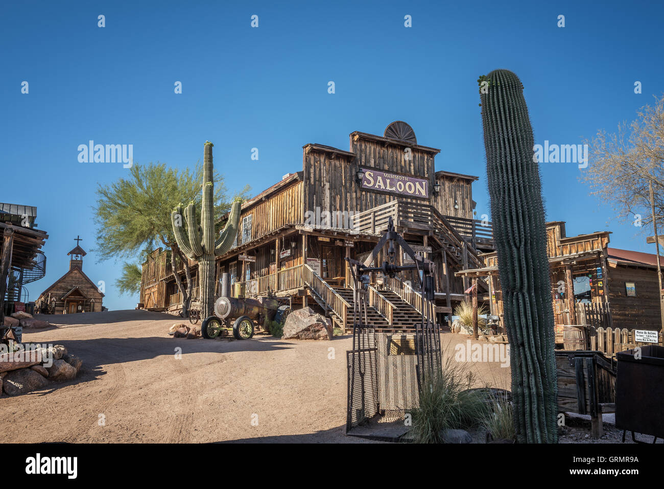 Old saloon and wooden church in Goldfield Ghost town Stock Photo