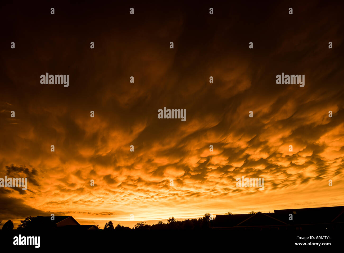 Formation of rare mammatus clouds after a thunder storm Stock Photo