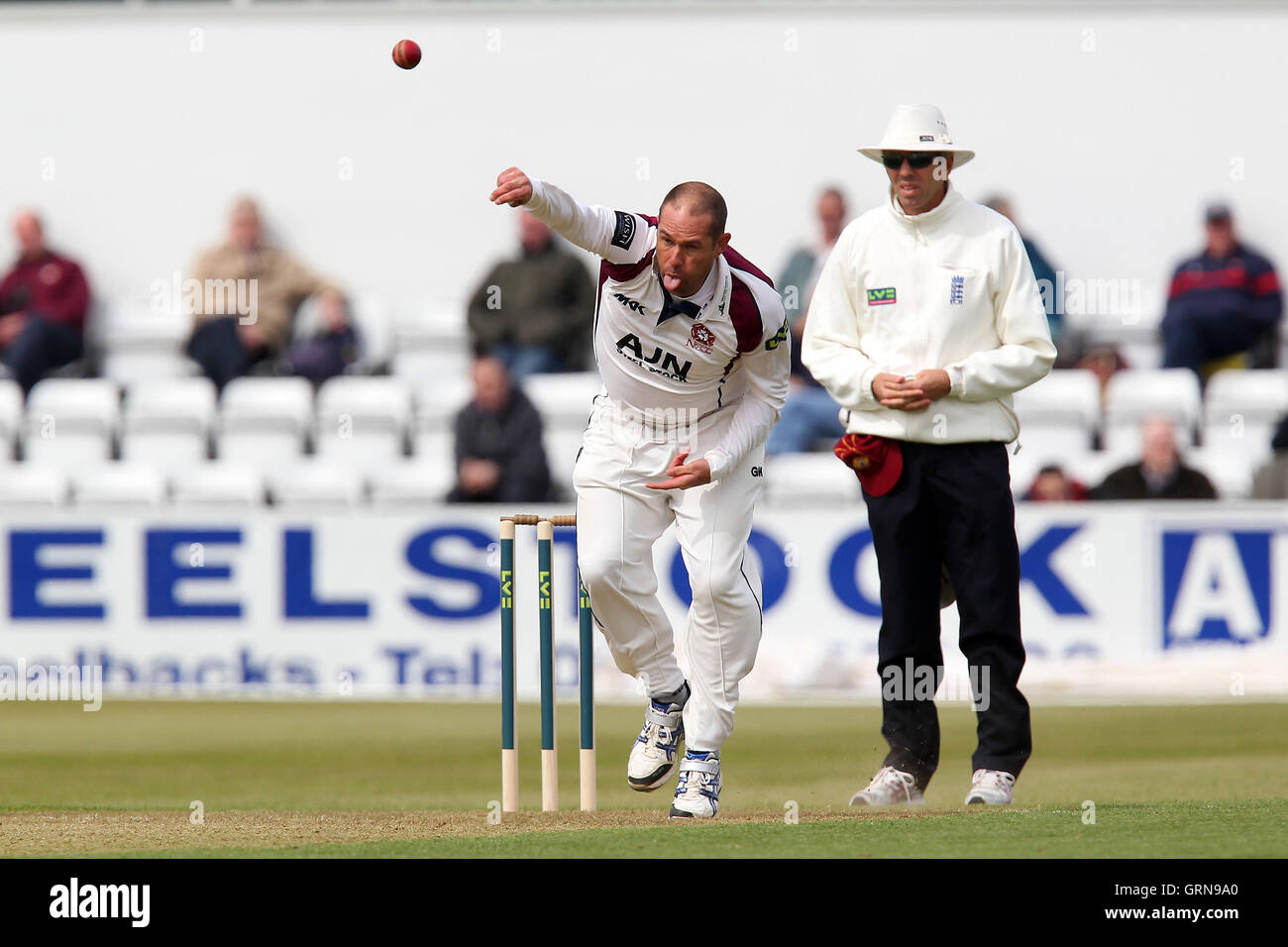 Andrew Hall in bowling action for Northants - Northamptonshire CCC vs Essex CCC - LV County Championship Division Two Cricket at the County Ground, Northampton - 17/04/13 Stock Photo