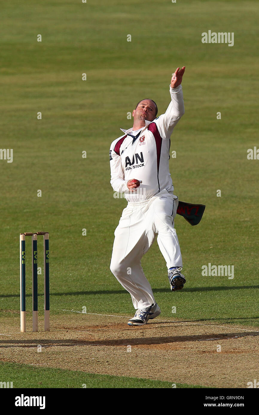 Andrew Hall in bowling action for Northants - Northamptonshire CCC vs Essex CCC - LV County Championship Division Two Cricket at the County Ground, Northampton - 18/04/13 Stock Photo