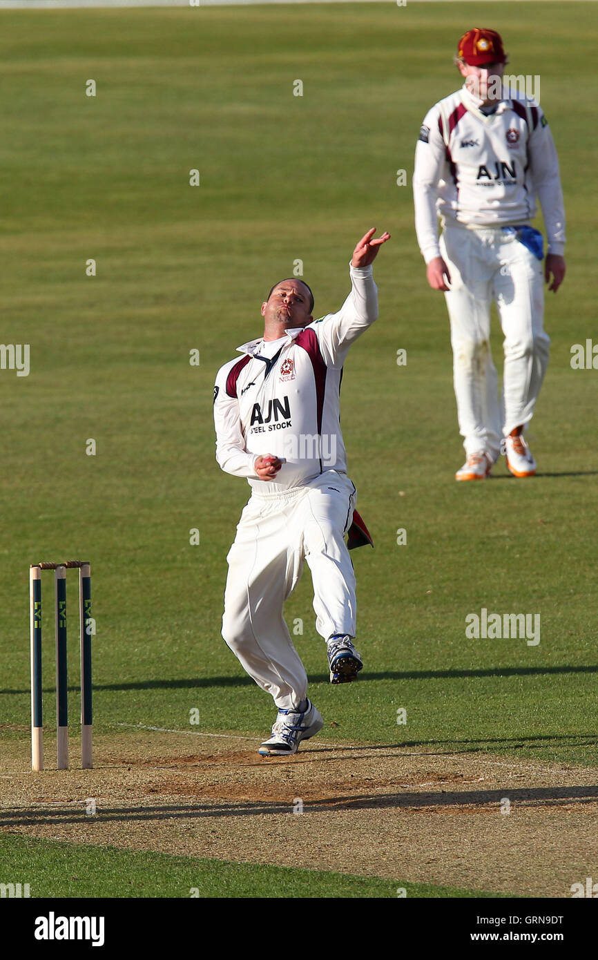 Andrew Hall in bowling action for Northants - Northamptonshire CCC vs Essex CCC - LV County Championship Division Two Cricket at the County Ground, Northampton - 18/04/13 Stock Photo
