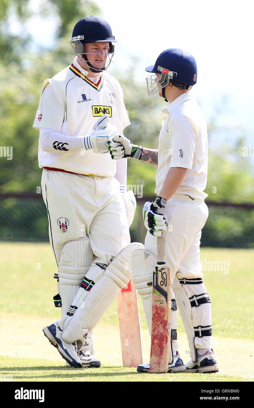 J Jackson (L) and A Hughes of Havering - Havering-atte-Bower CC vs Writtle CC - Mid-Essex Cricket League - 03/05/14 Stock Photo