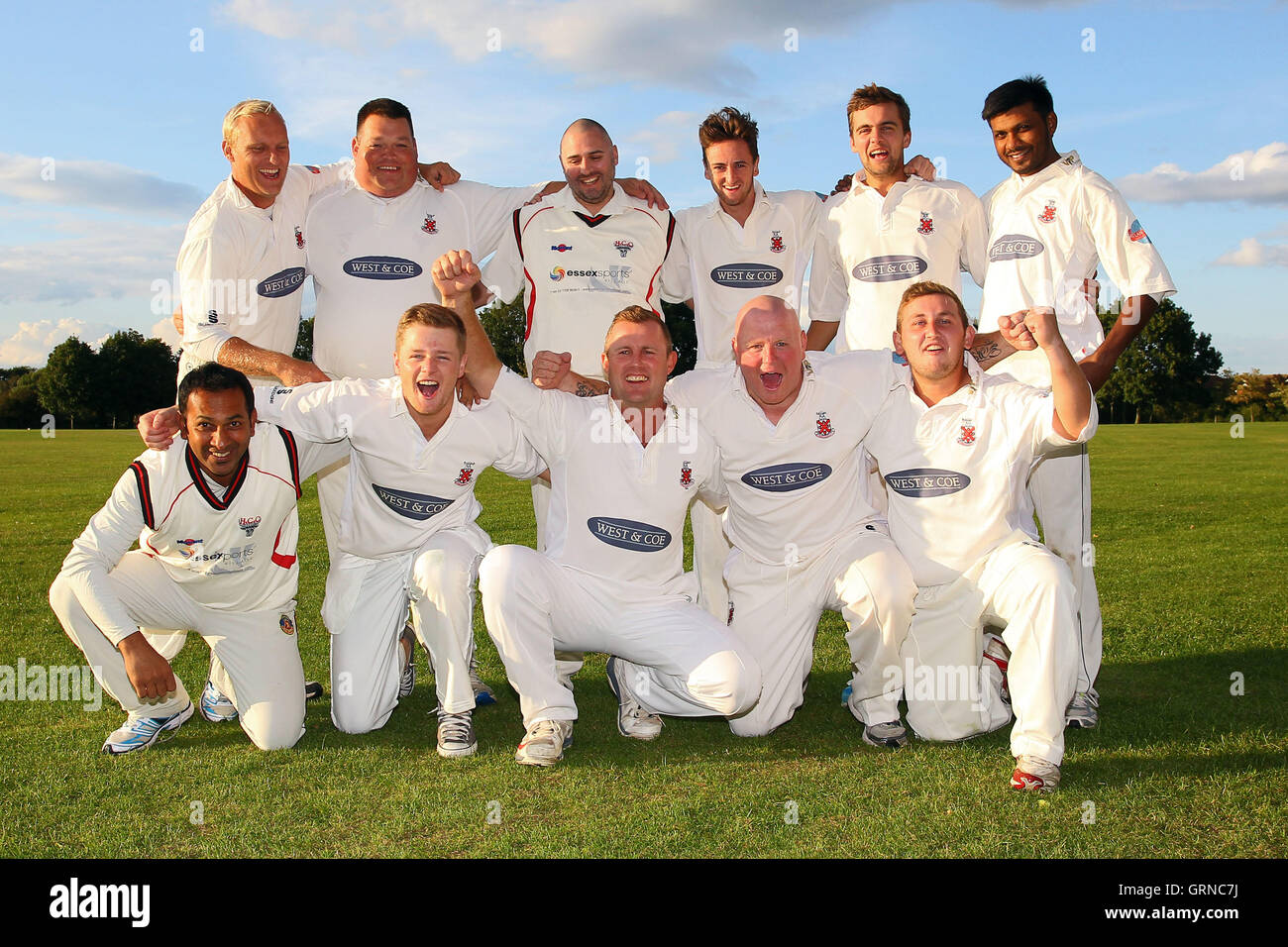 Hornchurch players celebrate winning promotion - Horndon-on-the-Hill CC vs Hornchurch CC - Essex Cricket League - 23/08/14 Stock Photo