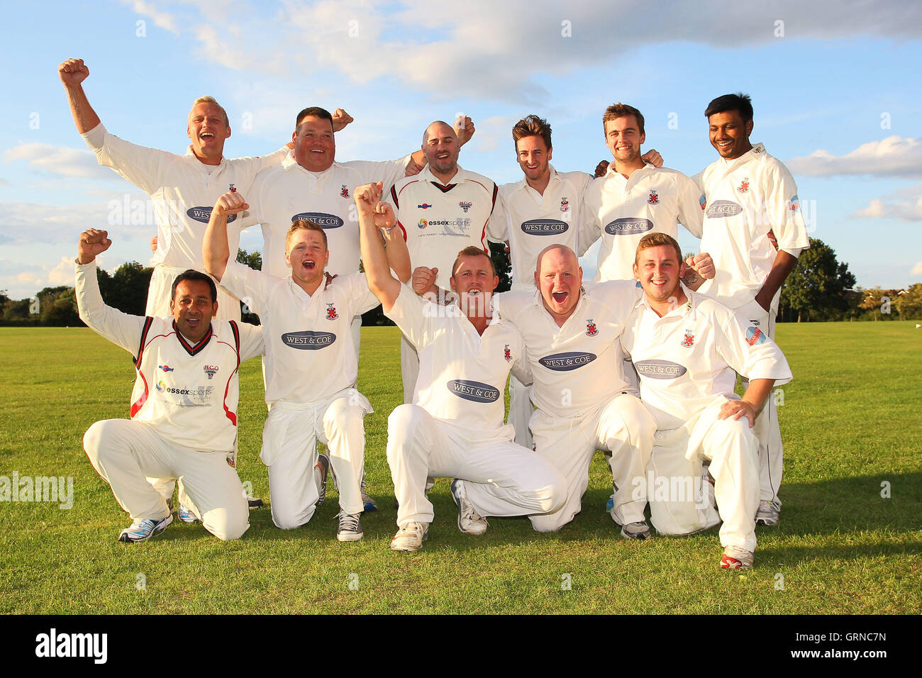 Hornchurch players celebrate winning promotion - Horndon-on-the-Hill CC vs Hornchurch CC - Essex Cricket League - 23/08/14 Stock Photo
