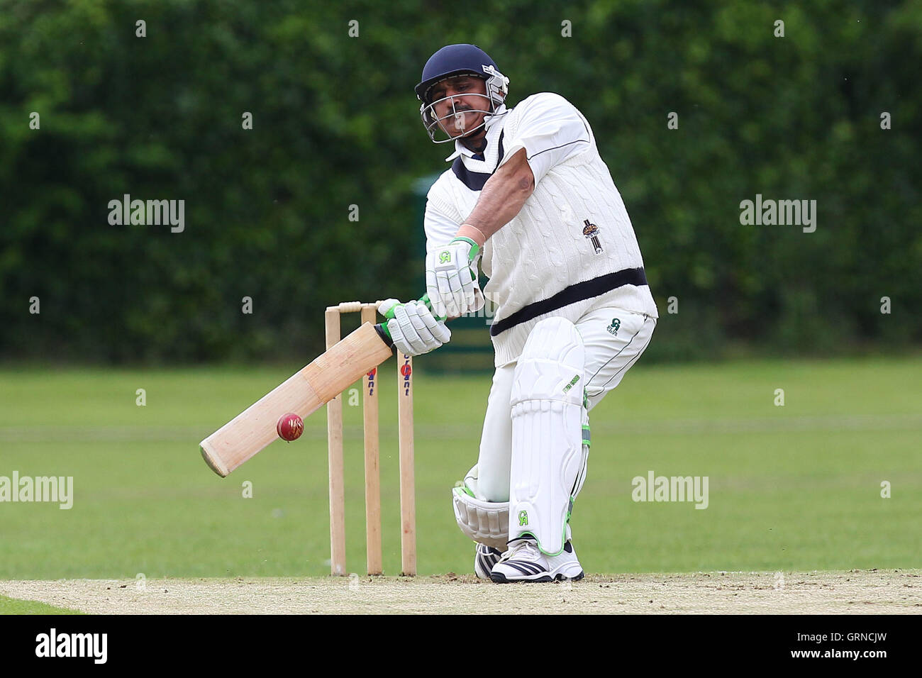 Arshad Ali in batting action for Upminster - Upminster CC vs Brentwood CC - Essex Cricket League - 07/06/14 Stock Photo