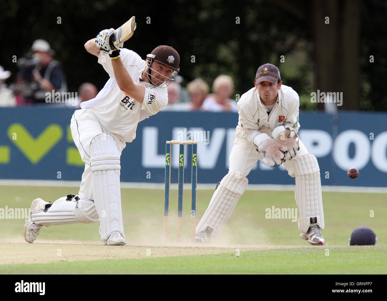 Century-maker Chris Schofield in batting action for Surrey as James ...