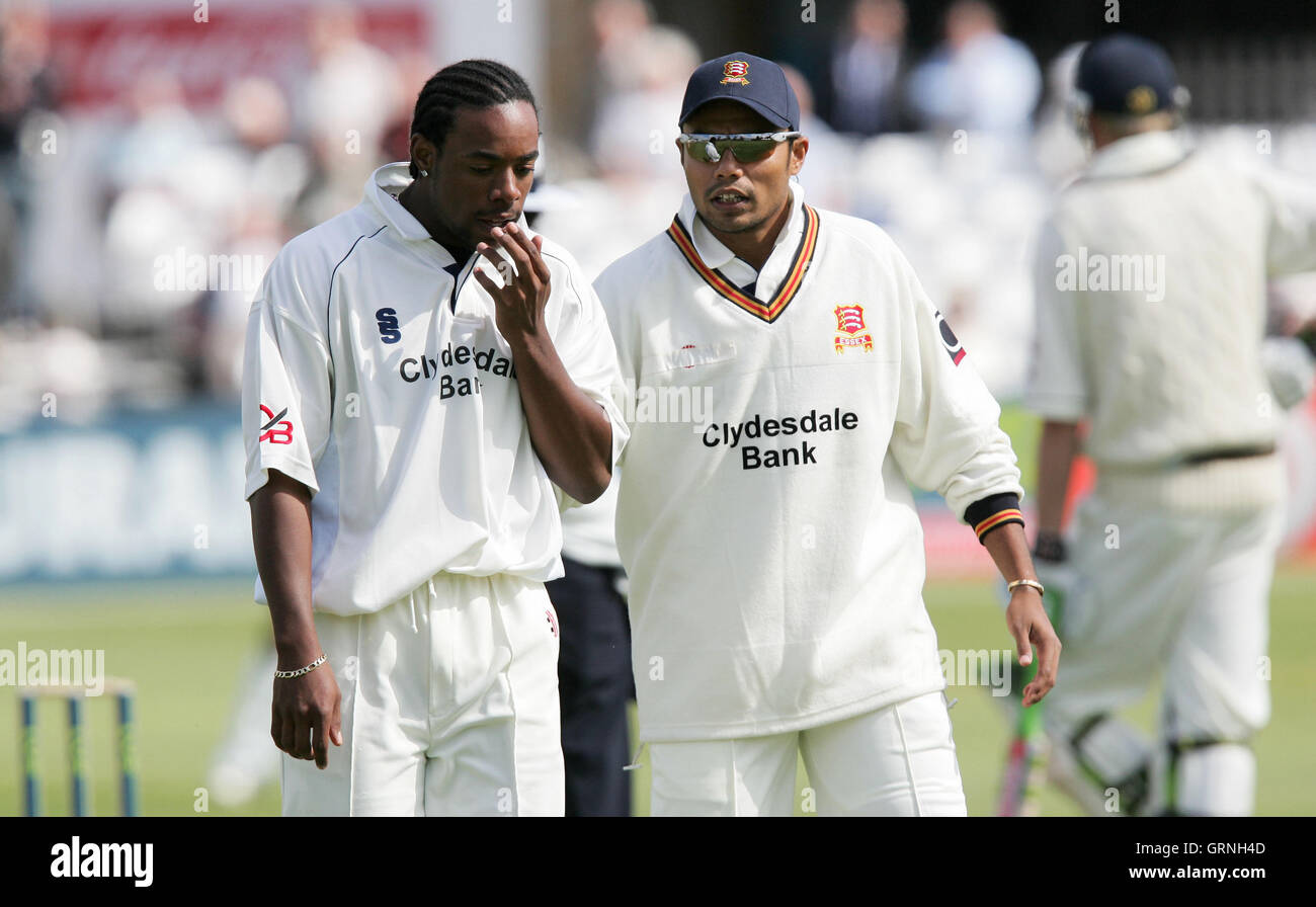 Mervyn Westfield (L) and Danish Kaneria - Essex CCC vs Derbyshire CCC at the Ford County Ground, Chelmsford, Essex - 18/04/07 Stock Photo