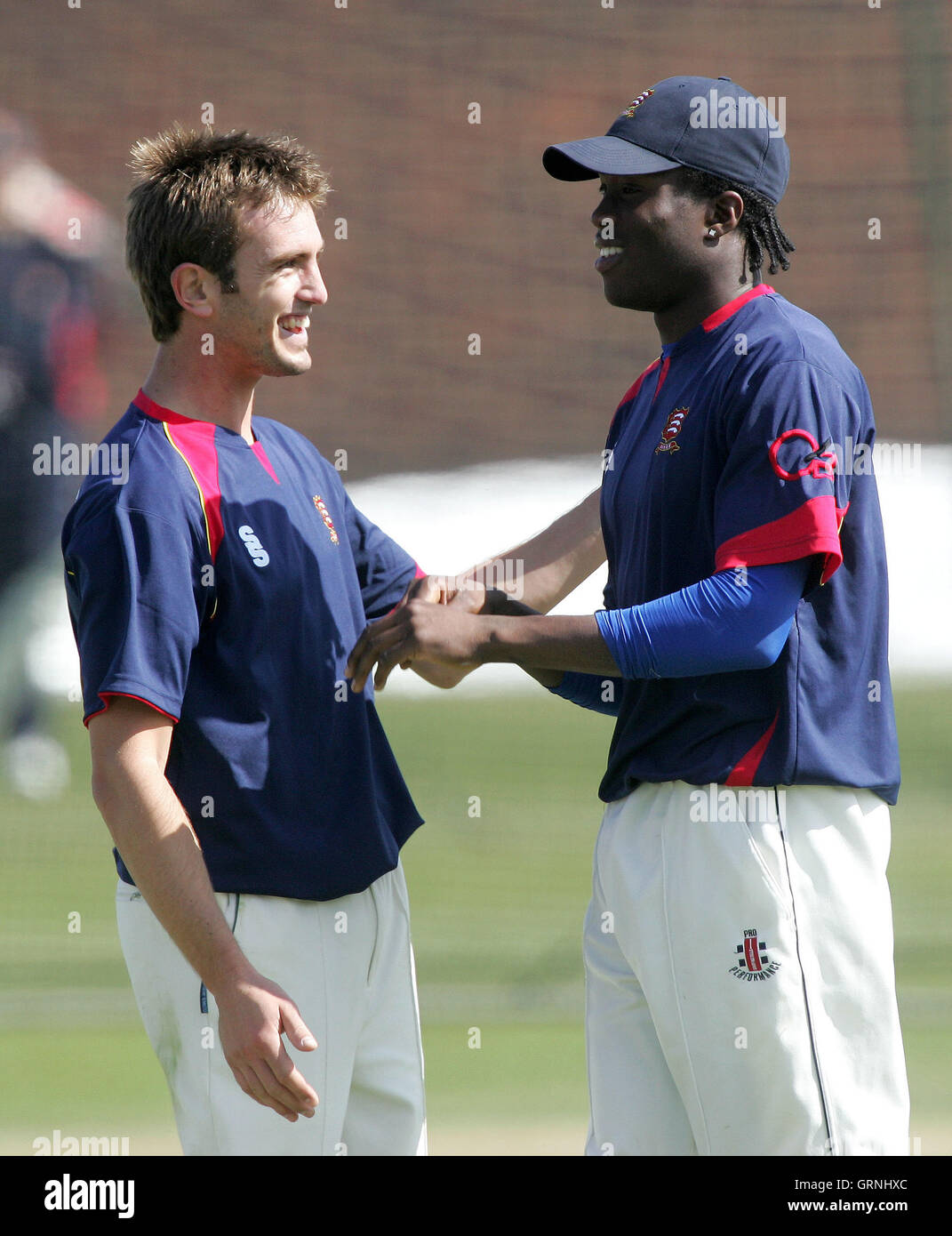 Trialist Steve Clark congratulates Maurice Chambers on his catch that dismissed Surrey batsman Mark Butcher - Essex CCC vs Surrey CCC - Friendly Match at Ford County Ground, Chelmsford, Essex - 05/04/07 Stock Photo