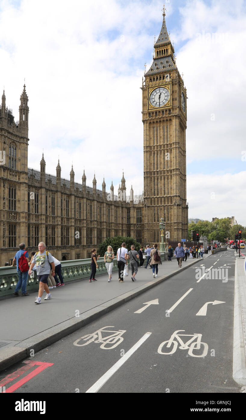 London's new, fully segregated cycle path on Westminster Bridge passes in front of Big Ben and the Houses of Parliament. Stock Photo