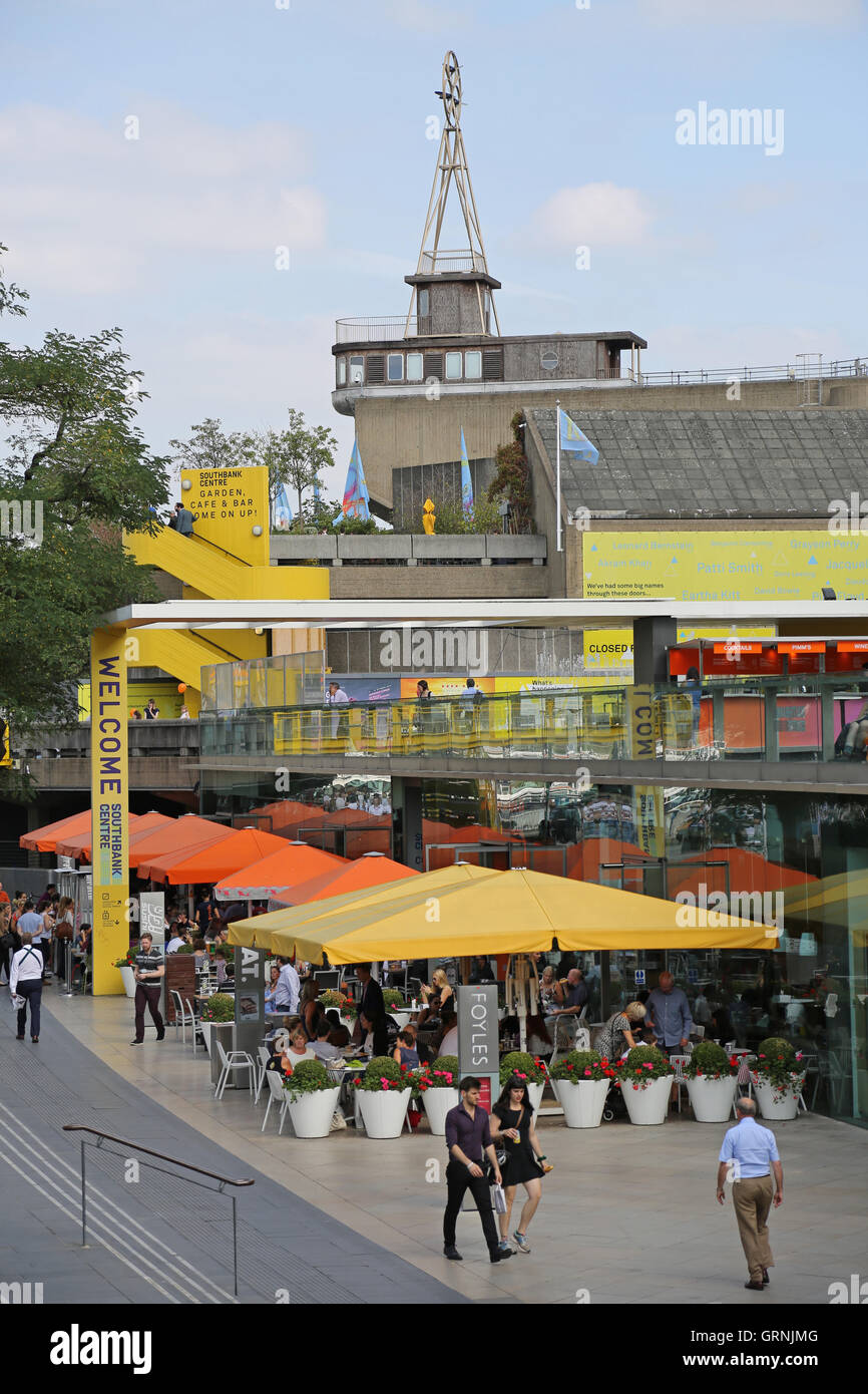 Open air restaurants on the Riverside terraces on London's South Bank between the river Thames and the Royal Festival Hall. Stock Photo