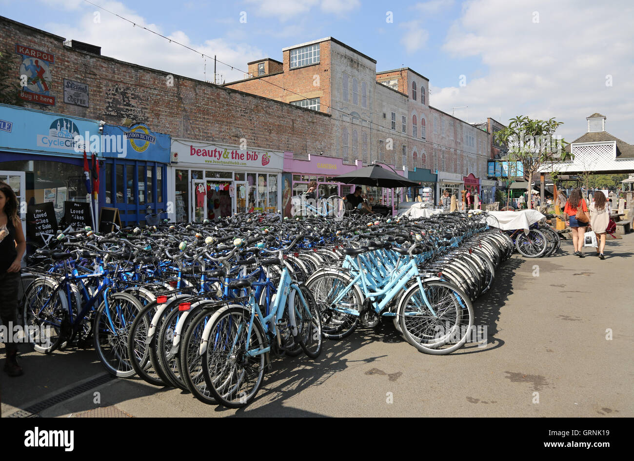 Bike hire shop at Gabriel's Wharf, close to the River Thames in London. Shows a large number of bicycles for hire. Stock Photo