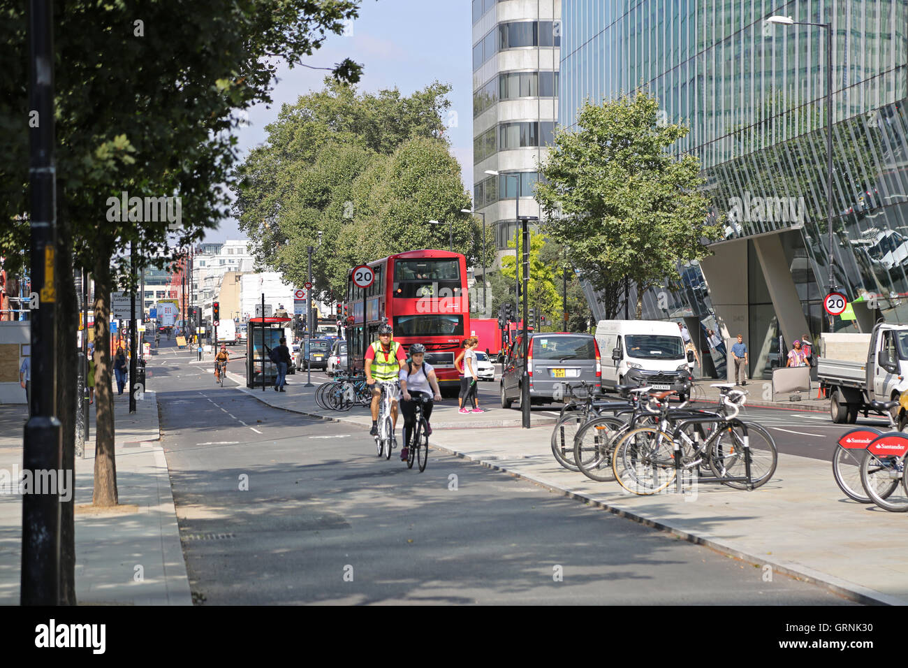 Cyclists on London's new, fully segregated north-south cycle super-highway on Blackfriars Road. Stock Photo
