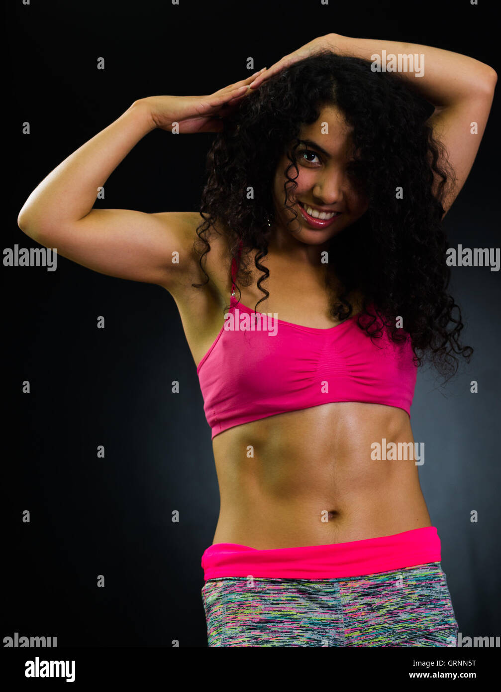 Woman showing off biceps abs hi-res stock photography and images - Alamy