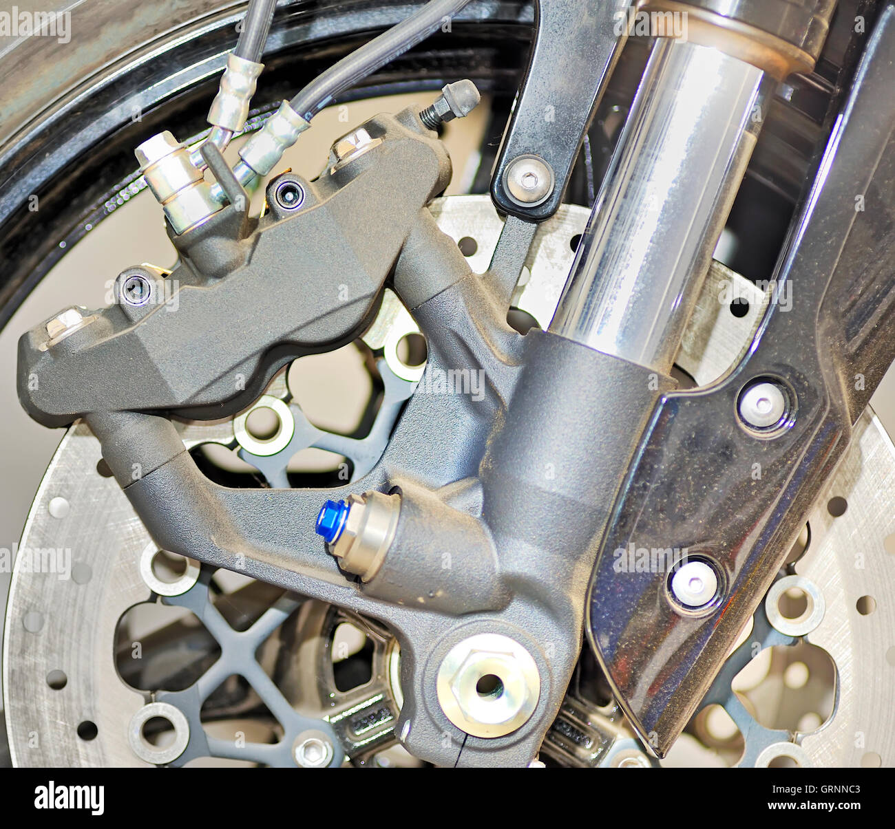 Closeup detail of a motorcycle's front wheel Stock Photo Alamy