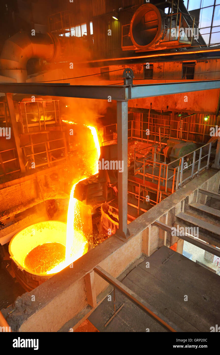 Pouring of liquid metal Stock Photo Alamy