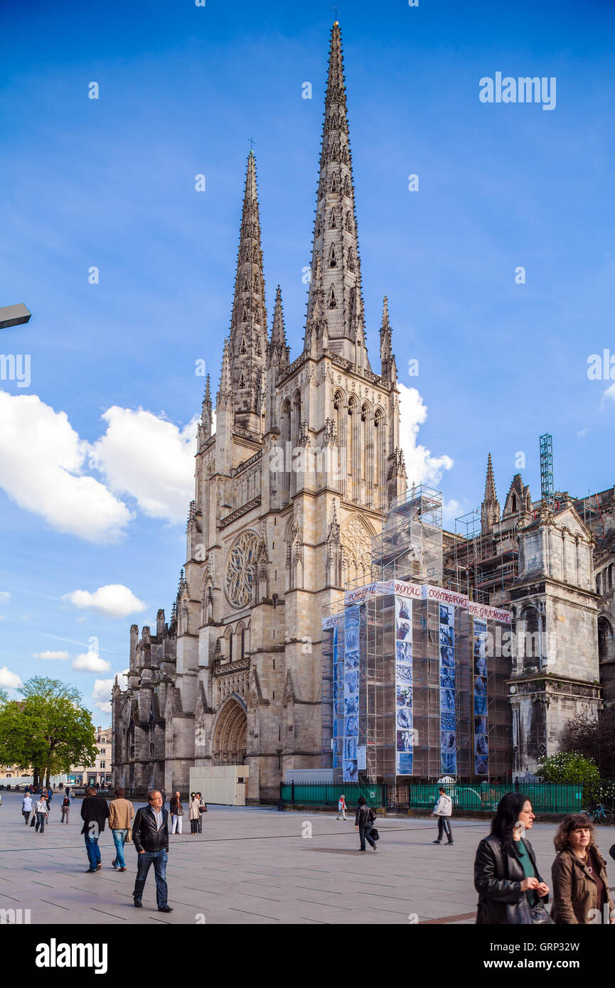 BORDEAUX, FRANCE - APRIL 4, 2011: French people walking near Saint Andre Cathedral (11th-15th c.) at spring Stock Photo