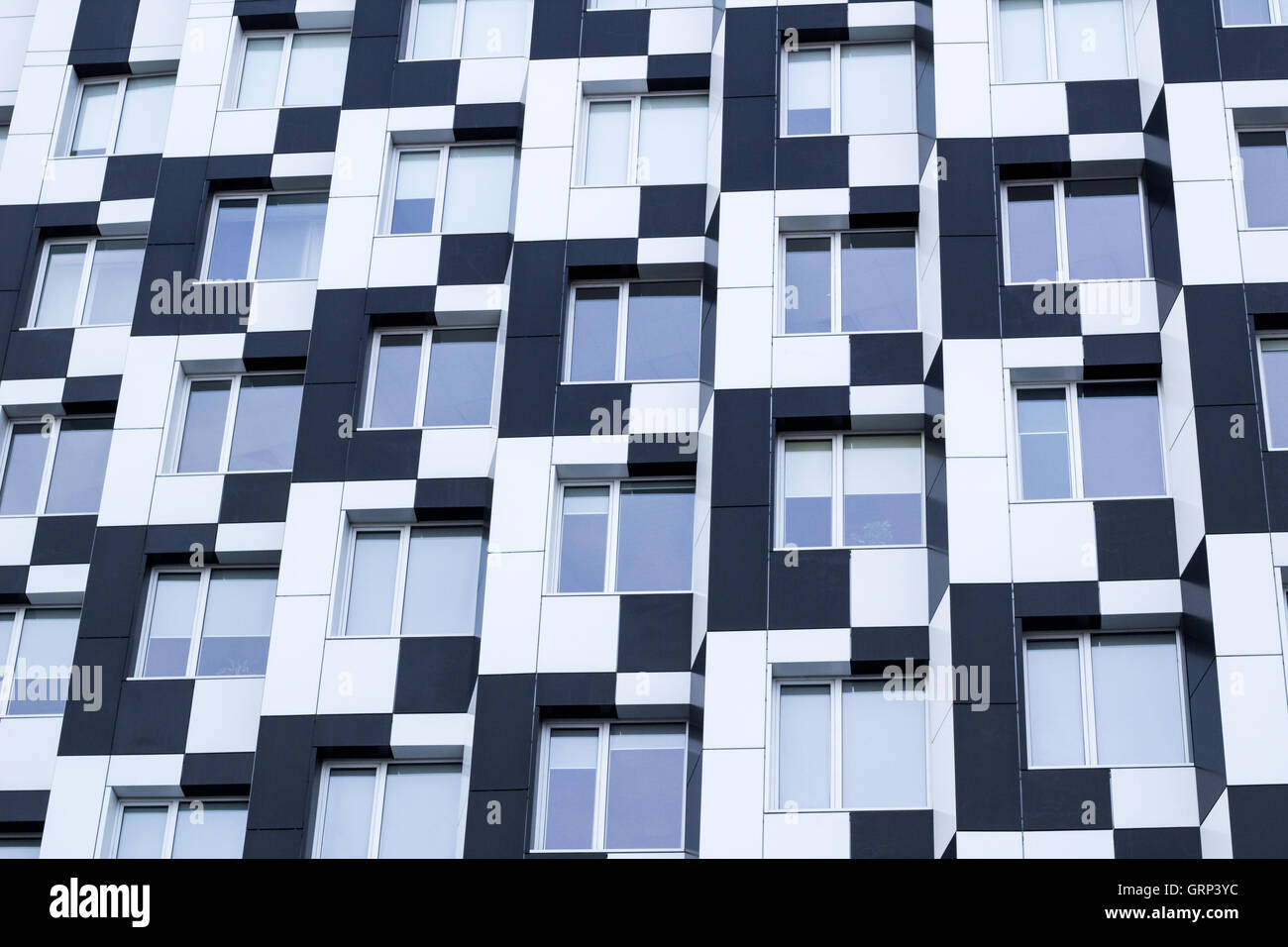 Black and white minimalistic bauhaus office building of business center - chequered background Stock Photo