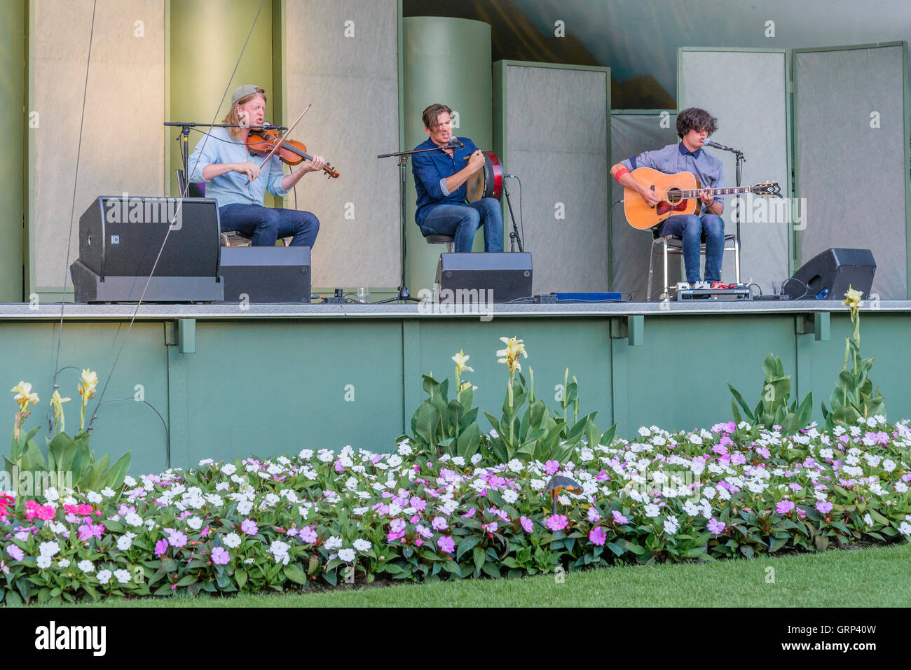 Ten Strings and a Goat skin perform at Butchart Gardens, Stock Photo