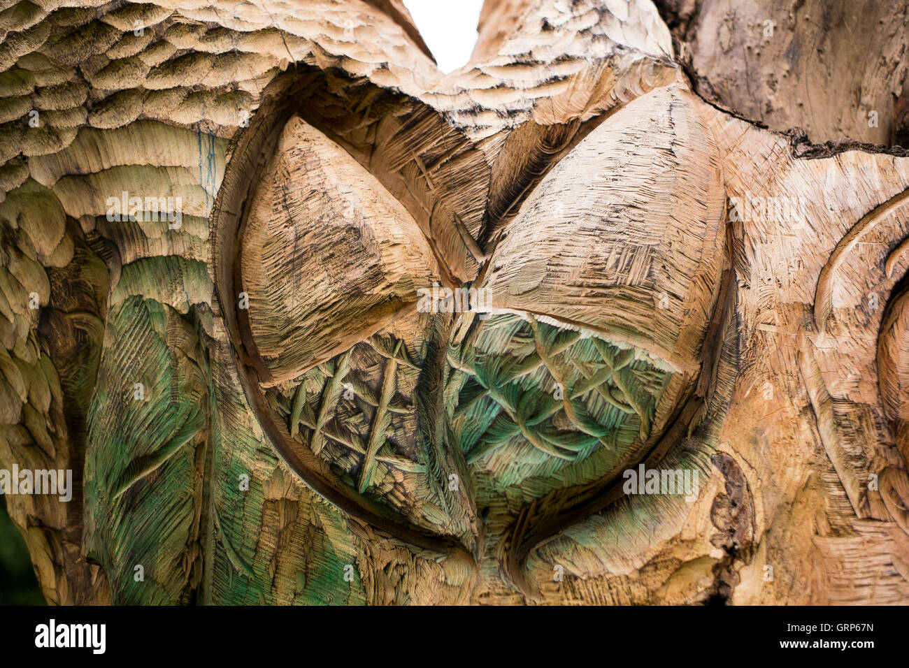 A wood carving created from a dead tree in the grounds of Castle Ashby House, Northamptonshire Stock Photo