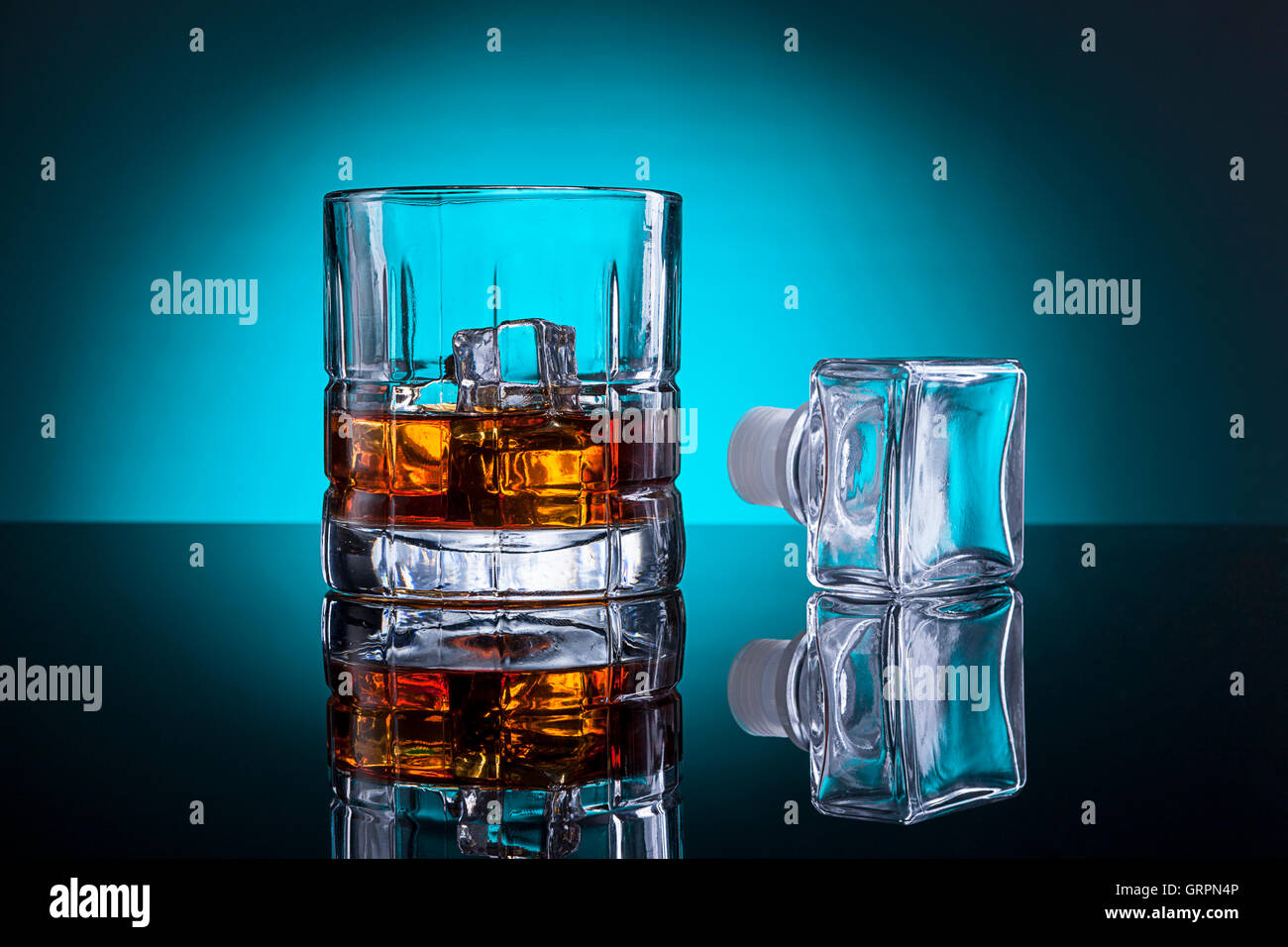Stopper by glass of liquor. Stock Photo