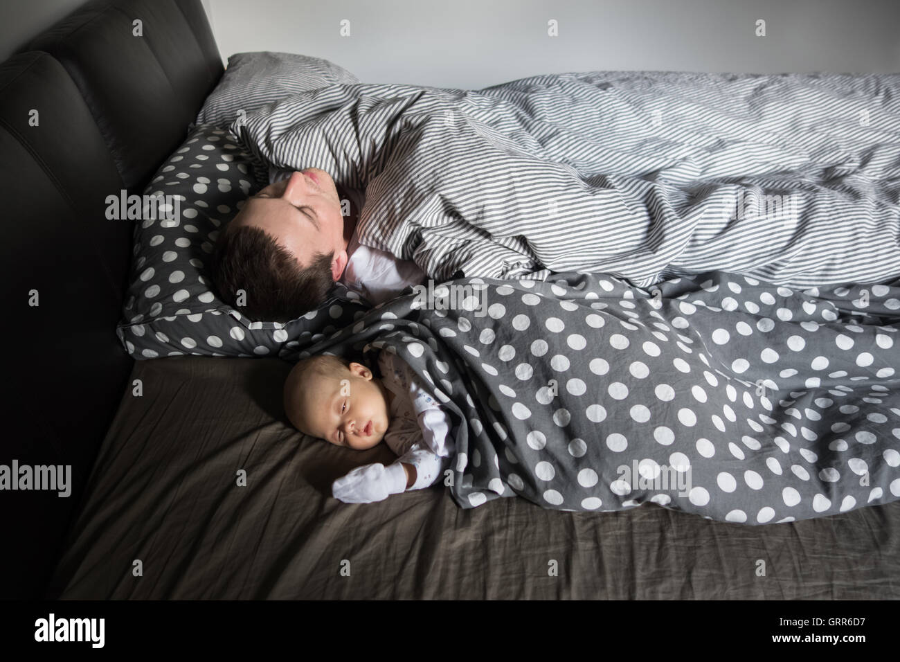 Newborn Baby boy sleep with his father Stock Photo Alamy