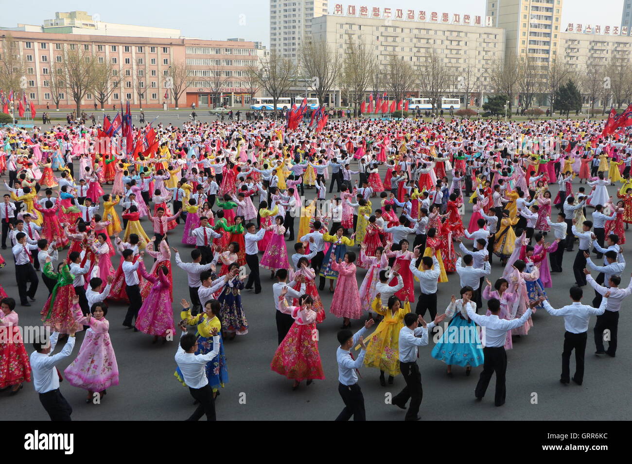 North Koreans enjoy a mass dance in a square, Pyongyang Stock Photo