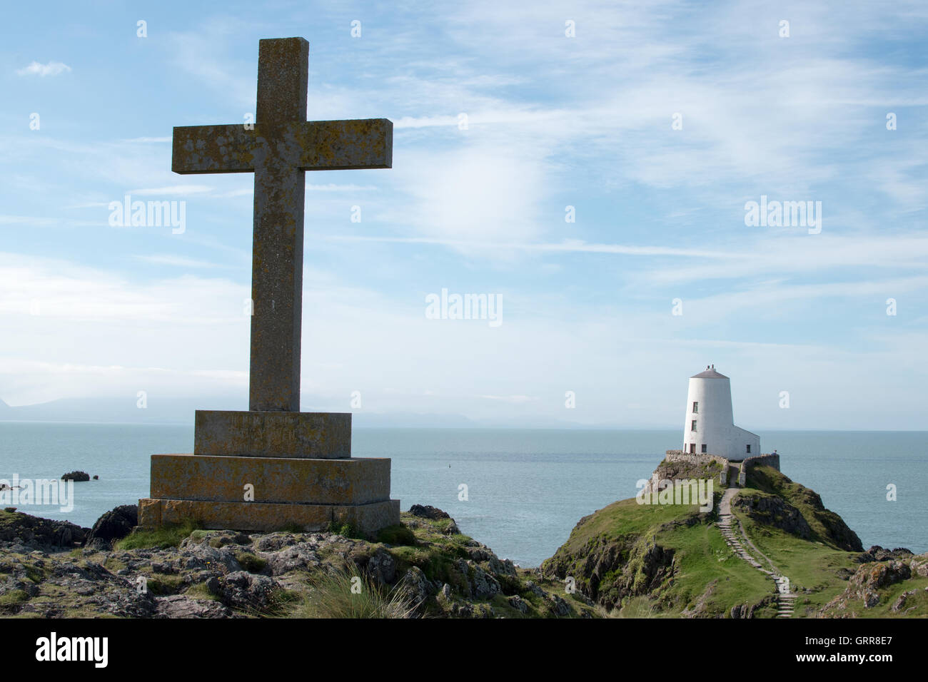 Tŵr Mawr lighthouse and cross at Llanddwyn.island Anglesey North Wales Stock Photo