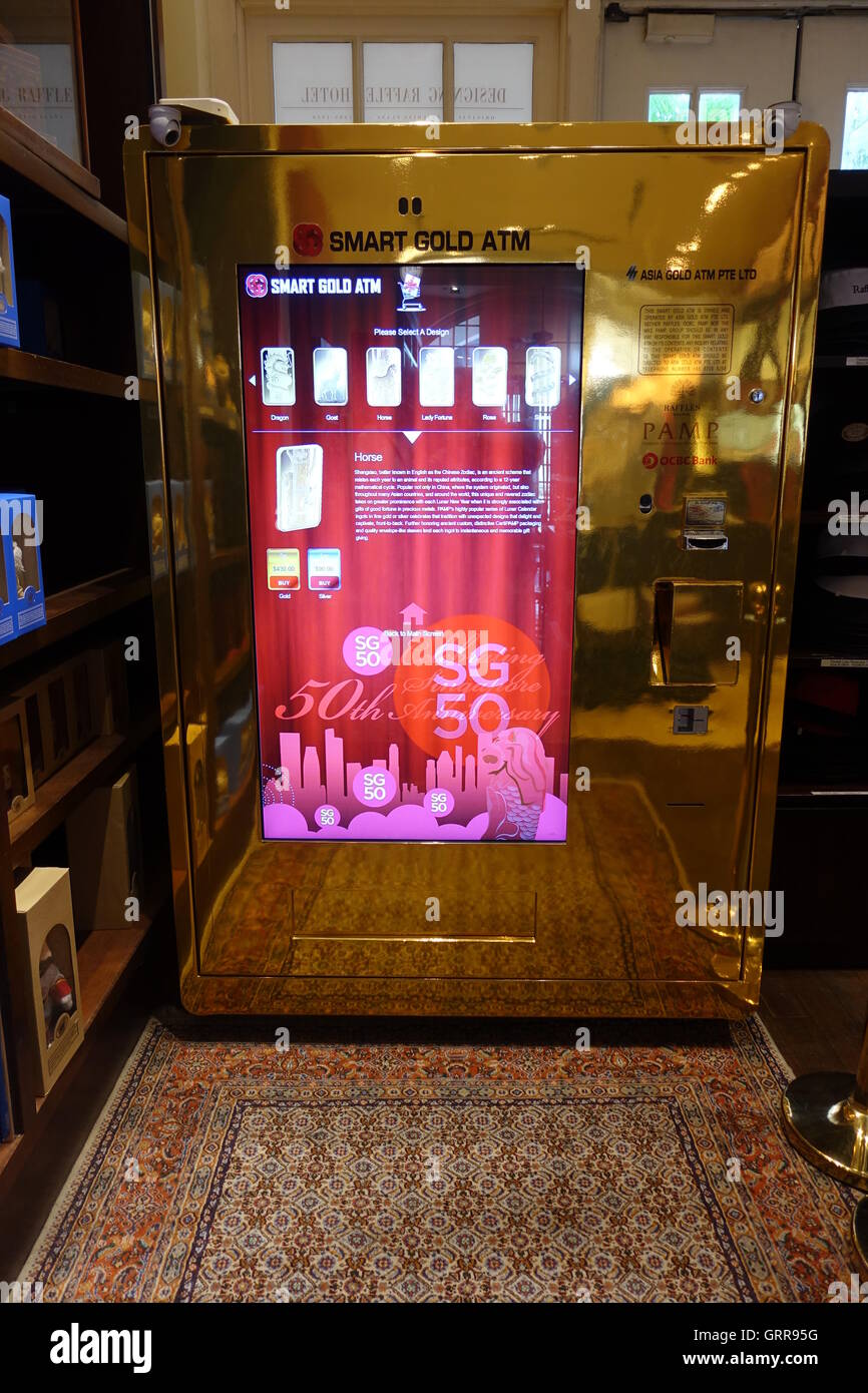Gold Bar (ingot) vending ATM Machine, inside the Raffles Hotel gift shop, Singapore. Stock Photo