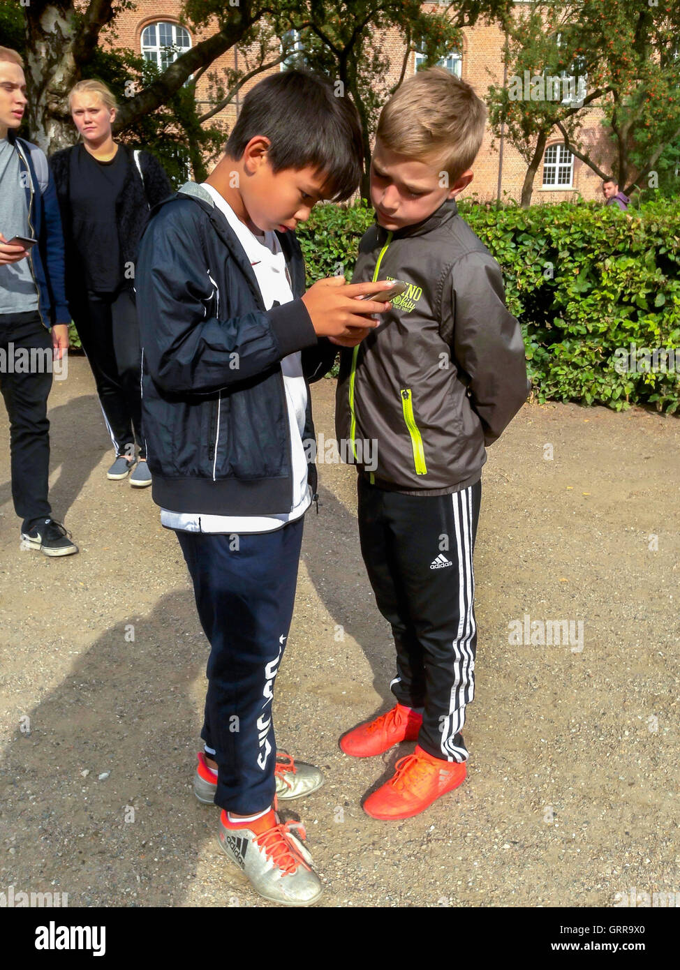 Copenhagen, Denmark, Danish Children Playing Smart Phone Game "Pokemon