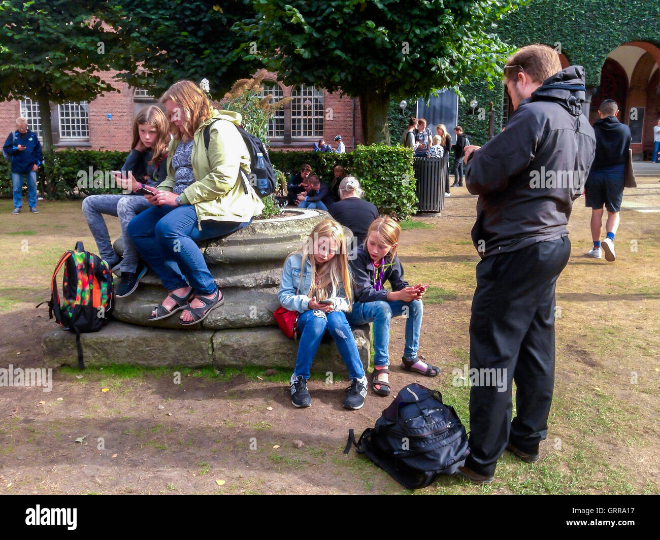 Copenhagen, Denmark, Group of Danish Children Playing Smart Phone Game