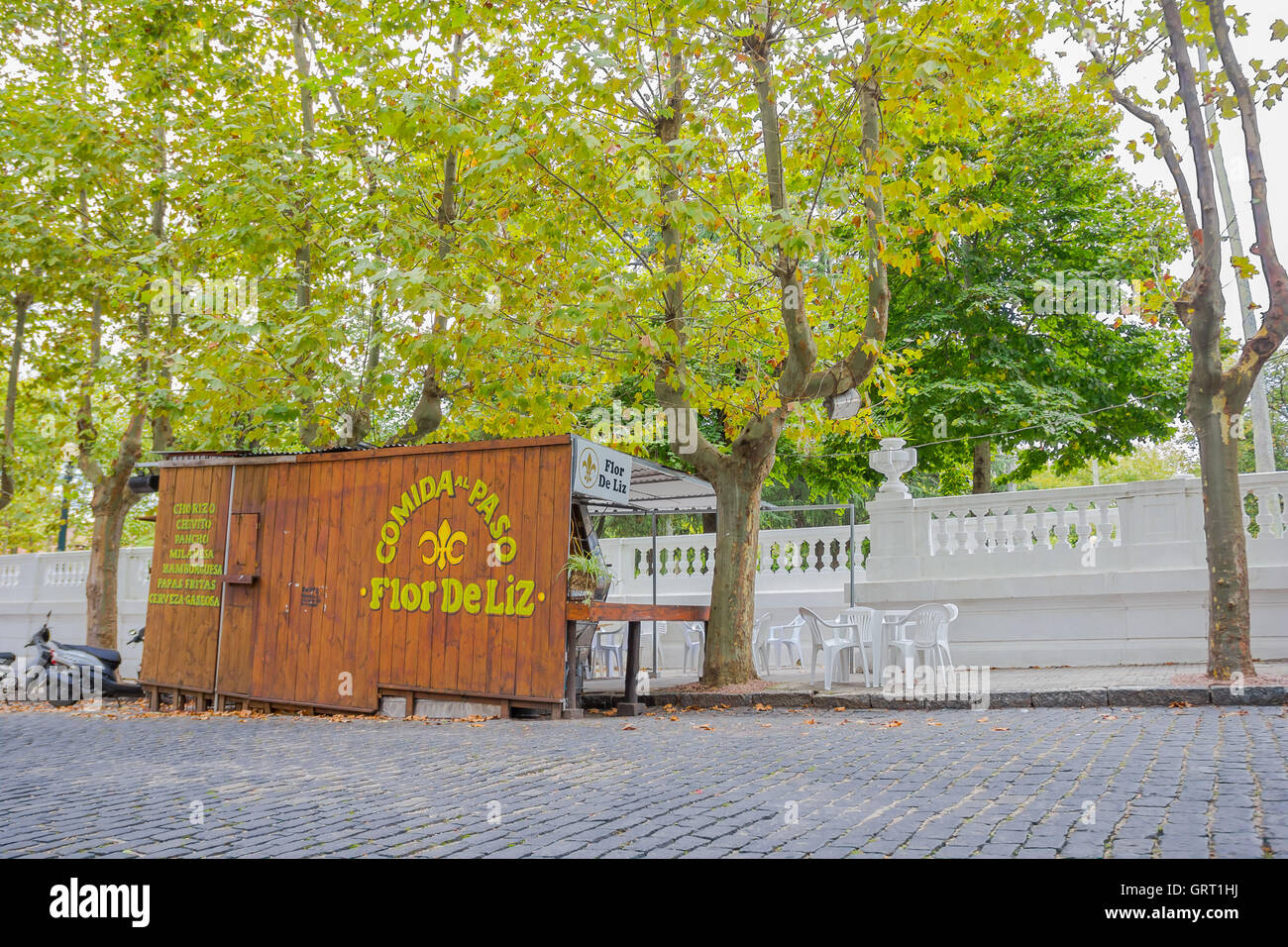 COLONIA DEL SACRAMENTO, URUGUAY - MAY 04, 2016: little food stand located in a street next to some trees Stock Photo