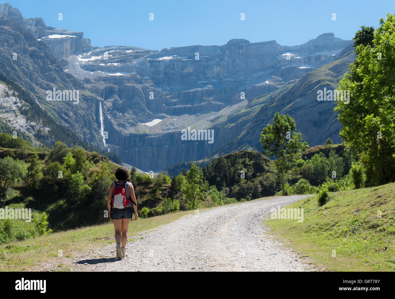 A woman hiker and cirque de Gavarnie in the French pyrenees Stock Photo ...