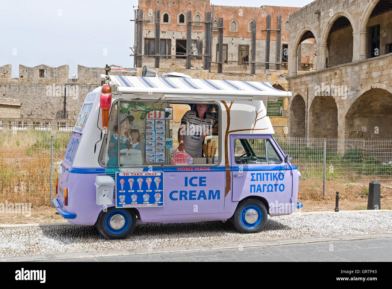 Ice cream vendor in purple van Stock Photo Alamy