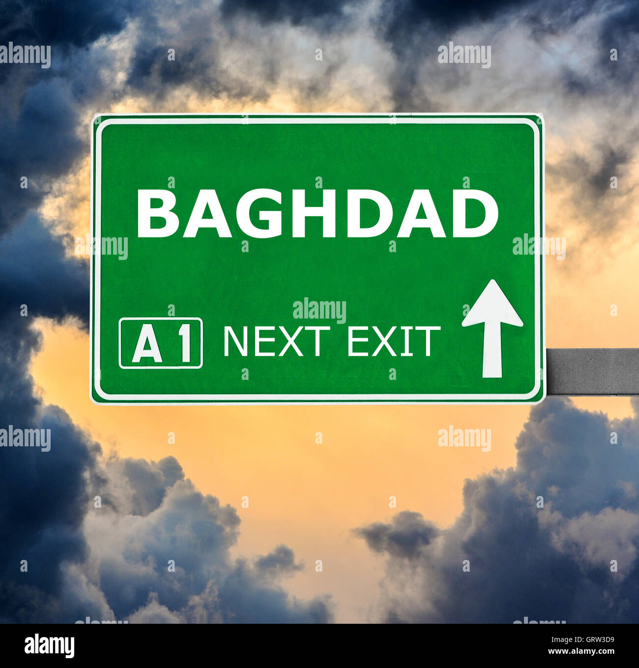 BAGHDAD road sign against clear blue sky Stock Photo