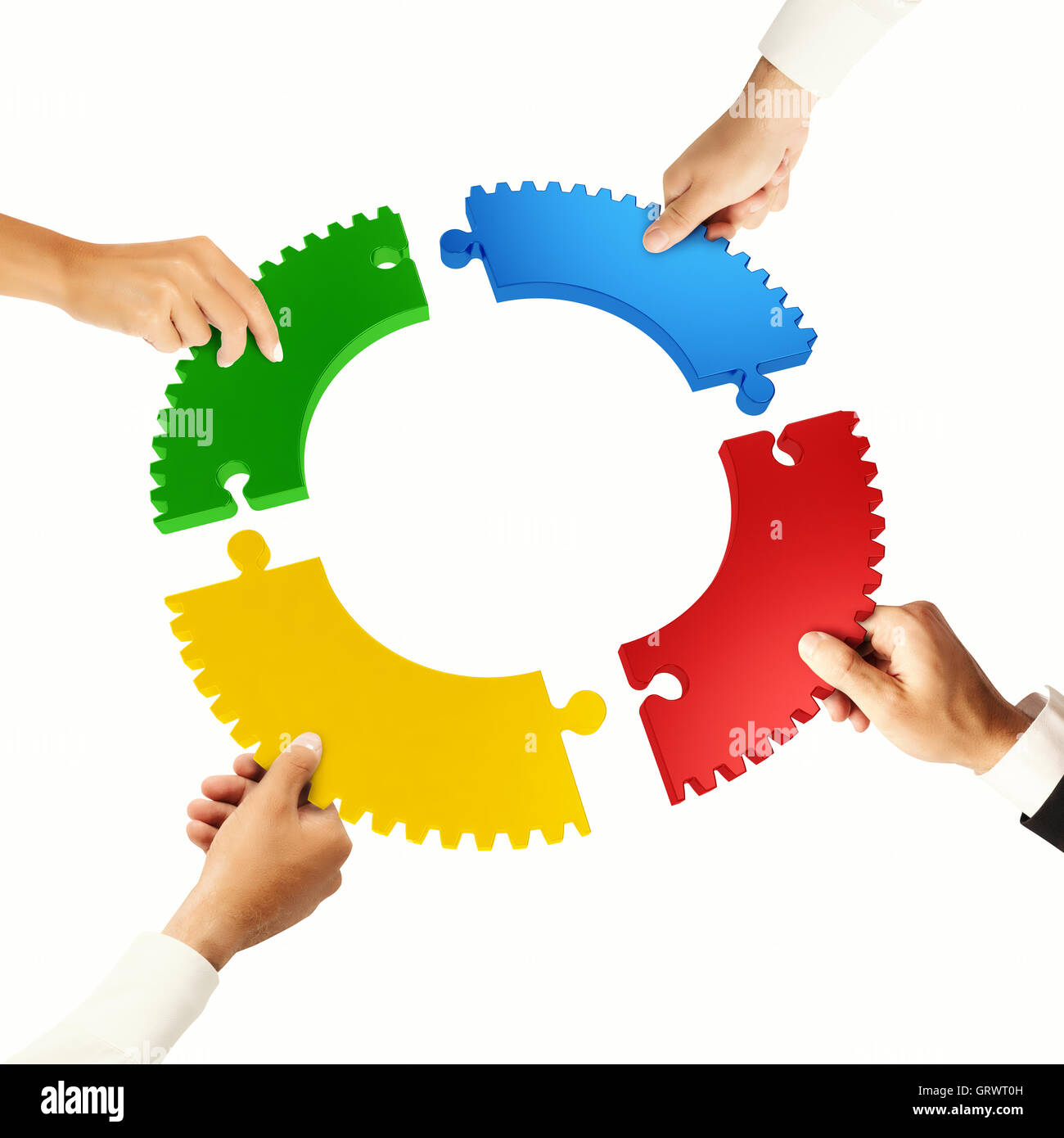 Teamwork and integration concept with puzzle pieces Stock Photo