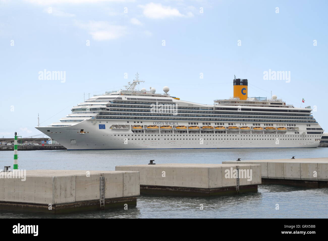 A regular sight. Cruise ships visit the Portuguese Island of Madeira Stock Photo