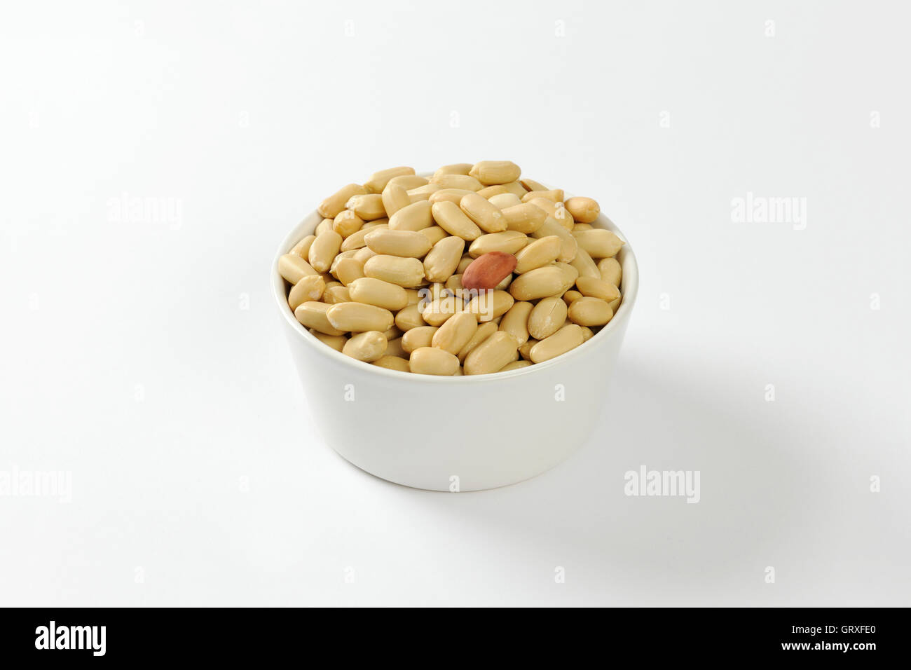 Bowl of unsalted shelled peanuts Stock Photo Alamy