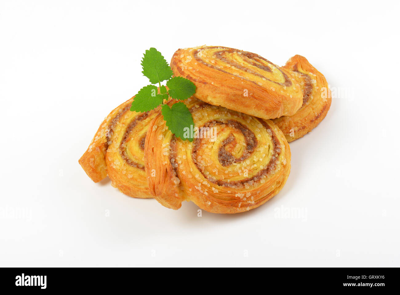 sweet cinnamon rolls on white background Stock Photo - Alamy