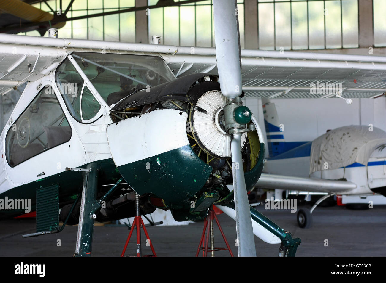 General prop aircraft motor maintenance in hangar Stock Photo