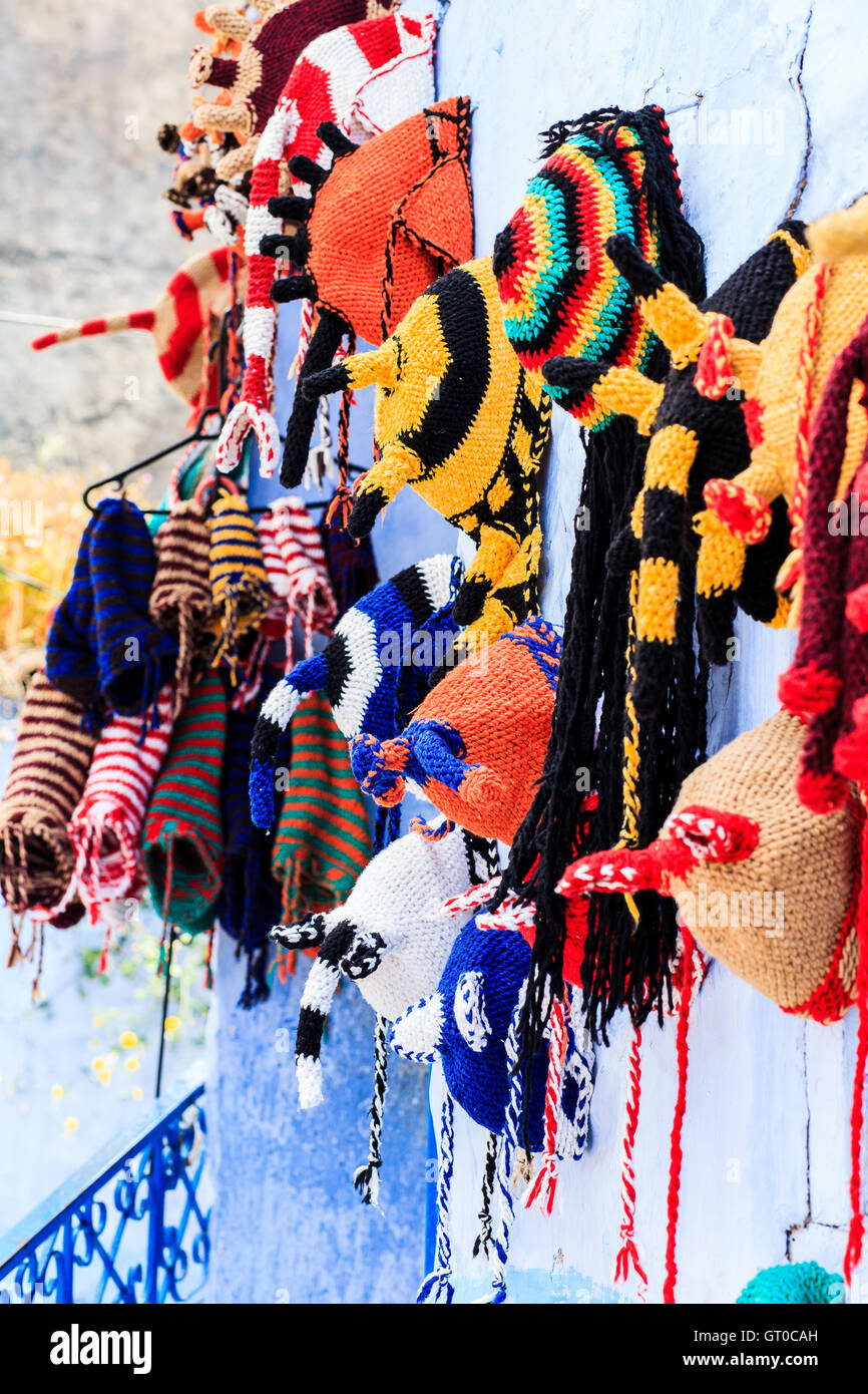 Colorful funny hats for sale in a flea market Stock Photo - Alamy