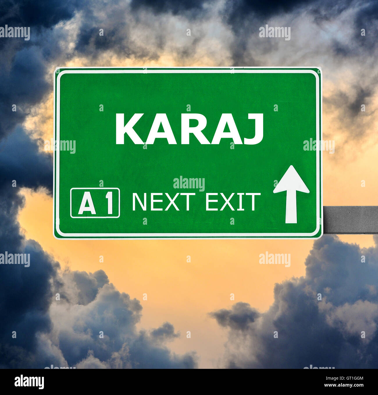 KARAJ road sign against clear blue sky Stock Photo