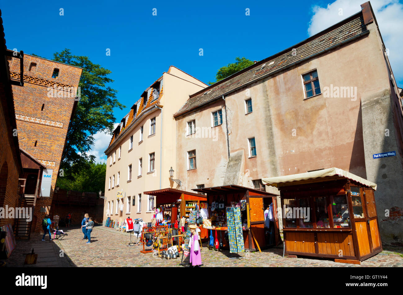 Souvenir stalls, pod Krzywa Wieza street, next to leaning tower, old town, Torun, Pomerania, Poland Stock Photo