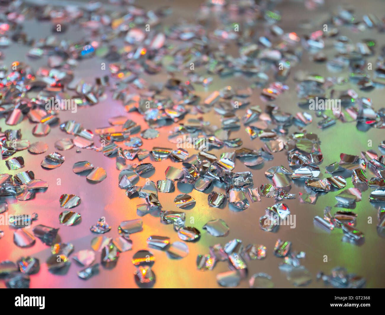 Glittering holiday background with multicolored lights and shallow focus Stock Photo